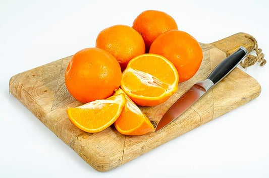 Fresh delicious Honeybell Oranges by RawJoy Farms